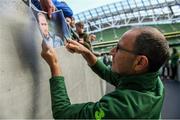 9 October 2018; Republic of Ireland manager Martin O'Neill signs autographs following a Republic of Ireland training session at the Aviva Stadium in Dublin. Photo by Stephen McCarthy/Sportsfile