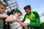 9 October 2018; Jeff Hendrick signs an autograph for Oliver Kierans, age 8, from Bailieborough, Cavan, following a Republic of Ireland training session at the Aviva Stadium in Dublin. Photo by Stephen McCarthy/Sportsfile