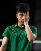 10 October 2018; Nhat Nguyen of Team Ireland, from Clarehall, Dublin, reacts after loosing a point to Shifeng Li of China during the men's badminton singles, quarter final round, in Tecnópolis park, Buenos Aires, on Day 4 of the Youth Olympic Games in Buenos Aires, Argentina. Photo by Eóin Noonan/Sportsfile