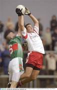 7 September 2003; Enda Devenney, Mayo, in action against Tyrone's Leo Meenan. All-Ireland U-21 Football Championship Semi-Final, Mayo v Tyrone, Markievicz Park, Sligo. Picture credit; Damien Eagers / SPORTSFILE *EDI*