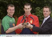 8 September 2003; Chris Adamson, St. Patrick's Athletic goalkeeper, centre, with Republic of Ireland goalkeeper Joe Murphy, left, and Mark Lee, Head of Sponsorship eircom, after winning the eircom Soccer Writers Association of Ireland player of the month for August. Malahide, Co. Dublin. Soccer.  Picture credit; David Maher / SPORTSFILE *EDI*