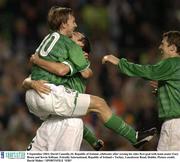 9 September 2003; David Connolly,10, Republic of Ireland, celebrates after scoring his sides first goal with team-mates Gary Breen and Kevin Kilbane. Friendly International, Republic of Ireland v Turkey, Lansdowne Road, Dublin. Picture credit; David Maher / SPORTSFILE *EDI*