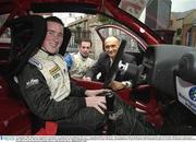 10 September 2003; Motorsport Ireland have introduced a new element for the judging for this year's &quot;Young Racing Driver of the Year&quot;. The young drivers will not along have to undergo an extensive interview but they will also have to demonstrate their skill on the track. This new Skills Test would not be possible but for the support of Dunlop Ireland, Irish Sports Council, Alfa Romeo and Mondello Park. Former Grand Prix driver Gabrielle Tarquini was on hand to brief finalists John O'Hara and Eoin Murray at the announcement in Dublin. Picture credit; Brendan Moran / SPORTSFILE *EDI*