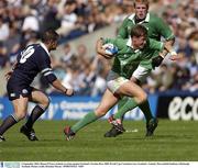 6 September 2003; Ronan O'Gara, Ireland, in action against Scotland's Gordon Ross. RBS World Cup Countdown test, Scotland v Ireland, Murrayfield Stadium, Edinburgh, Scotland. Picture credit; Brendan Moran / SPORTSFILE *EDI*