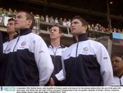 6 September 2003; Robbie Keane, right, Republic of Ireland, stands in the dug-out for the national anthem before the start of the game with team-mates Alan Quinn, left, and Andy O'Brien. European Championship Group Ten qualifier, Republic of Ireland v Russia, Lansdowne Road, Dublin. Picture credit; David Maher / SPORTSFILE *EDI*