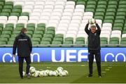 12 October 2018; Denmark manager Aage Hareide checks the bounce of the ball during a Denmark training session at the Aviva Stadium in Dublin. Photo by Stephen McCarthy/Sportsfile