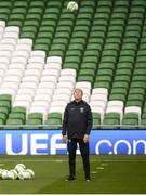 12 October 2018; Denmark manager Aage Hareide checks the bounce of the ball during a Denmark training session at the Aviva Stadium in Dublin. Photo by Stephen McCarthy/Sportsfile
