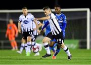12 October 2018; Ronan Murray of Dundalk in action against Noe Baba of Waterford during the SSE Airtricity League Premier Division match between Waterford and Dundalk at the RSC in Waterford. Photo by Seb Daly/Sportsfile