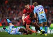 13 October 2018; CJ Stander of Munster, supported by team-mate Rory Scannell, is tackled by Stuart Townsend, left, and Gareth Steenson of Exeter Chiefs during the Heineken Champions Cup Pool 2 Round 1 match between Exeter Chiefs and Munster at Sandy Park in Exeter, England. Photo by Brendan Moran/Sportsfile