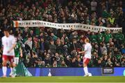 13 October 2018; Republic of Ireland supporters hold up a banner in the crowd in memory of the late Oran Tully during the UEFA Nations League B group four match between Republic of Ireland and Denmark at the Aviva Stadium in Dublin. Photo by Ramsey Cardy/Sportsfile