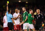 13 October 2018; Shane Duffy of Republic of Ireland receives a yellow card from referee Javier Estrada for simulation during the UEFA Nations League B group four match between Republic of Ireland and Denmark at the Aviva Stadium in Dublin. Photo by Stephen McCarthy/Sportsfile