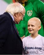 13 October 2018; President of Ireland Michael D Higgins speaks to one of the matchday mascots prior during the UEFA Nations League B group four match between Republic of Ireland and Denmark at the Aviva Stadium in Dublin. Photo by Stephen McCarthy/Sportsfile