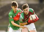 14 October 2018; James Larkin of Castlerea St. Kevin's in action against Eoghan Derwin of St.Brigid's during the Roscommon County Minor Club Football Championship Final match between Castlerea St. Kevin's and St Brigid's at Dr Hyde Park, Roscommon. Photo by Barry Cregg/Sportsfile