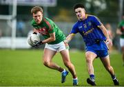 14 October 2018; Ronan Stack of St Brigid's in action against Jamie Fahy of Clann na Gael during the Roscommon County Senior Club Football Championship Final match between Clann na Gael and St Brigid's at Dr Hyde Park in Roscommon. Photo by Barry Cregg/Sportsfile