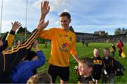 14 October 2018; Cian Flynn of St Peter's Dunboyne celebrates with young fans after during the Meath County Senior Club Football Championship Final match between St Peter's Dunboyne and Summerhill at Páirc Tailteann in Navan, Meath. Photo by Brendan Moran/Sportsfile
