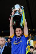 14 October 2018; Clann na Gael captain Donal Shine lifts the Fahey cup following the Roscommon County Senior Club Football Championship Final match between Clann na Gael and St Brigid's at Dr Hyde Park, Roscommon. Photo by Barry Cregg/Sportsfile
