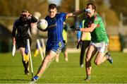 14 October 2018; Ronan Gavin of Clann na Gael in action against Darragh Sheehy of St.Brigid's during the Roscommon County Senior Club Football Championship Final match between Clann na Gael and St Brigid's at Dr Hyde Park, Roscommon. Photo by Barry Cregg/Sportsfile