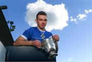 15 October 2018; Ballyboden St. Enda's hurler Simon Lambert with The New Ireland Assurance Company Perpetual Challenge Cup during a Dublin SHC / SFC Finals Media Launch at Parnell Park in Dublin. Photo by Piaras Ó Mídheach/Sportsfile
