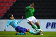 16 October 2018; Adam Idah of Republic of Ireland is tackled by Ludovit Reis of Netherlands during the 2018/19 UEFA Under-19 European Championships Qualifying Round match between Republic of Ireland and Netherlands at City Calling Stadium, in Lissanurlan, Co. Longford. Photo by Harry Murphy/Sportsfile