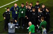 16 October 2018; Republic of Ireland assistant manager Roy Keane with ballkids ahead of the UEFA Nations League B group four match between Republic of Ireland and Wales at the Aviva Stadium in Dublin. Photo by Ramsey Cardy/Sportsfile