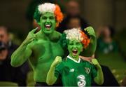 16 October 2018; Republic of Ireland supporters Clayton Peppard, age 12, with his dad Shane, from Clondalkin, Co Dublin, prior to the UEFA Nations League B group four match between Republic of Ireland and Wales at the Aviva Stadium in Dublin. Photo by Harry Murphy/Sportsfile