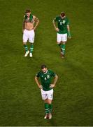 16 October 2018; Republic of Ireland players Jeff Hendrick, left, Shane Duffy, centre, and James McClean walk off the pitch following their defeat in the UEFA Nations League B group four match between Republic of Ireland and Wales at the Aviva Stadium in Dublin. Photo by Ramsey Cardy/Sportsfile