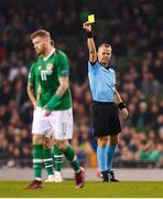 16 October 2018; James McClean of Republic of Ireland receives a yellow card from referee Björn Kuipers during the UEFA Nations League B group four match between Republic of Ireland and Wales at the Aviva Stadium in Dublin. Photo by Harry Murphy/Sportsfile