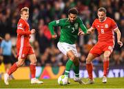 16 October 2018; Cyrus Christie of Republic of Ireland in action against Andy King of Wales during the UEFA Nations League B group four match between Republic of Ireland and Wales at the Aviva Stadium in Dublin. Photo by Stephen McCarthy/Sportsfile