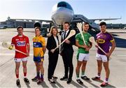 18 October 2018;  Ruth Ranson, Director of Communications Aer Lingus and Paul Flynn, GPA CEO, along with hurlers, from left, Daniel Kearney of Cork, Podge Collins of Clare, Tom Morrissey of Limerick and Conor McDonald of Wexford, were at Dublin Airport this morning where Aer Lingus, in partnership with the GAA and GPA, unveiled the one-of-a-kind customised playing kit for the Fenway Hurling Classic which takes place at Fenway Park in Boston on November 18th. Aer Lingus will once again be the Official Airline of the Event and will be responsible for flying the four teams to Boston. Photo by Sam Barnes/Sportsfile