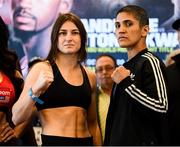19 October 2018; Katie Taylor and Cindy Serrano, right, square off after weighing in at the Boston Harbour Hotel ahead of their WBA & IBF World Lightweight title bout on Saturday night at the TD Garden in Boston, Massachusetts, USA. Photo by Stephen McCarthy/Sportsfile
