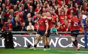 20 October 2018; Sam Arnold, left, of Munster is congratulated by team-mate Andrew Conway after scoring his side's fourth try during the Heineken Champions Cup Pool 2 Round 2 match between Munster and Gloucester at Thomond Park in Limerick. Photo by Diarmuid Greene/Sportsfile
