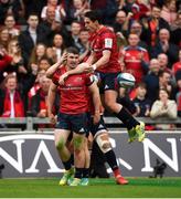 20 October 2018; Sam Arnold, left, of Munster is congratulated by team-mates Andrew Conway, hidden, and Joey Carbery after scoring his side's fourth try during the Heineken Champions Cup Pool 2 Round 2 match between Munster and Gloucester at Thomond Park in Limerick. Photo by Diarmuid Greene/Sportsfile