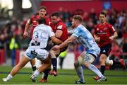 20 October 2018; Dave Kilcoyne of Munster is tackled by Fraser Balmain, left, and Tom Savage of Gloucester  during the Heineken Champions Cup Pool 2 Round 2 match between Munster and Gloucester at Thomond Park in Limerick. Photo by Sam Barnes/Sportsfile