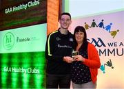 20 October 2018; Dublin and Raheny footballer Brian Fenton presents the 'Hero Award' to Mary Maloney of Ballinderreen during the GAA National Healthy Club Conference at Croke Park Stadium, in Dublin. Photo by David Fitzgerald/Sportsfile