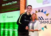 20 October 2018; Dublin and Raheny footballer Brian Fenton presents the 'Hero Award' to Liz Gardiner of Castletown Liam Mellows during the GAA National Healthy Club Conference at Croke Park Stadium, in Dublin. Photo by David Fitzgerald/Sportsfile
