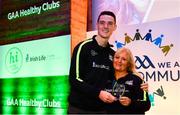 20 October 2018; Dublin and Raheny footballer Brian Fenton presents the 'Hero Award' to Maria Curtis of Raheny during the GAA National Healthy Club Conference at Croke Park Stadium, in Dublin. Photo by David Fitzgerald/Sportsfile