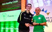 20 October 2018; Dublin and Raheny footballer Brian Fenton presents the 'Hero Award' to Colman Motherway of Killeagh GAA Club during the GAA National Healthy Club Conference at Croke Park Stadium, in Dublin. Photo by David Fitzgerald/Sportsfile
