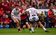 20 October 2018; Andrew Conway of Munster is tackled by Mark Atkinson and Matt Banahan of Gloucester during the Heineken Champions Cup Pool 2 Round 2 match between Munster and Gloucester at Thomond Park in Limerick. Photo by Diarmuid Greene/Sportsfile