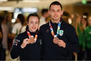 21 October 2018; Sean McCarthy-Crean of Team Ireland, from Cloghroe, Cork, with his bronze medal from the men's Kumite, +65KG, right, and Dearbhla Rooney of Team Ireland, from Manorhamilton, Leitrim, with her bronze medal from the women's featherweight boxing on their return from the Youth Olympic Games in Buenos Aires at Dublin Airport in Dublin. Photo by Eóin Noonan/Sportsfile