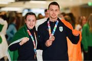 21 October 2018; Sean McCarthy-Crean of Team Ireland, from Cloghroe, Cork, with his bronze medal from the men's Kumite, +65KG, right, and Dearbhla Rooney of Team Ireland, from Manorhamilton, Leitrim, with her bronze medal from the women's featherweight boxing on their return from the Youth Olympic Games in Buenos Aires at Dublin Airport in Dublin. Photo by Eóin Noonan/Sportsfile