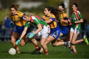 21 October 2018; Cora Staunton of Carnacon in action against Emma Lowther, left, and Roisin Flynn of Knockmore during the Mayo County Senior Club Ladies Football Final match between Carnacon and Knockmore at Kilmeena GAA Club in Mayo. Photo by David Fitzgerald/Sportsfile