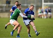 21 October 2018; Dermot Molloy of Naomh Conaill Glenties in action against Michael Carroll of Gaoth Dobhair during the Donegal County Senior Club Football Championship Final match between Naomh Conaill Glenties and Gaoth Dobhair at MacCumhaill Park, in Ballybofey, Donegal. Photo by Oliver McVeigh/Sportsfile