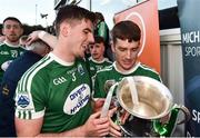 21 October 2018; Daire O'Baoill and Christopher McFadden of Gaoth Dobhair with the Maguire cup after the Donegal County Senior Club Football Championship Final match between Naomh Conaill Glenties and Gaoth Dobhair at MacCumhaill Park, in Ballybofey, Donegal. Photo by Oliver McVeigh/Sportsfile