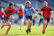 22 October 2018; Ella May Spain of Scoil Mhuire Sandymount, Co. Dublin, in action against Liv Foley, left, and Mairéad Hanratty of Belgrove Senior GNS, Clontarf, Co. Dublin, during day 1 of the Allianz Cumann na mBunscol Finals at Croke Park in Dublin.  Photo by Sam Barnes/Sportsfile