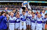 22 October 2018; Cathal Manning of Scoil Mhuire BNS, Marino, Co. Dublin, celebrates with teammates and the cup during day 1 of the Allianz Cumann na mBunscol Finals at Croke Park in Dublin.  Photo by Sam Barnes/Sportsfile