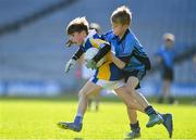 22 October 2018; Fiachra Codd of Scoil Treasa, Firhouse, Co. Dublin, in action against Mark O'Meara of St Mary's BNS, Booterstown, Co. Dublin, during day 1 of the Allianz Cumann na mBunscol Finals at Croke Park in Dublin.  Photo by Sam Barnes/Sportsfile