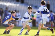 22 October 2018;  Aidan Tancred of Scoil Mhuire BNS, Marino, Co. Dublin, in action against Calum Hanaphy of Drimnagh Castle PS, Co. Dublin, during day 1 of the Allianz Cumann na mBunscol Finals at Croke Park in Dublin.  Photo by Sam Barnes/Sportsfile