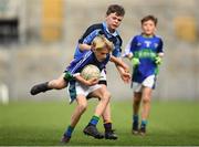 23 October 2018; Jack O'Flaherty from St. Oliver Plunkett NS, Malahide, Co Dublin, in action against Mark Collins from Scoil San Treasa, Mount Merrion, Co Dublin, during day 2 of the Allianz Cumann na mBunscol Finals at Croke Park in Dublin. Photo by Harry Murphy/Sportsfile