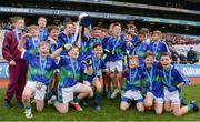 23 October 2018; St. Oliver Plunkett NS, Malahide, Co Dublin, players celebrate with the trophy during day 2 of the Allianz Cumann na mBunscol Finals at Croke Park in Dublin. Photo by Harry Murphy/Sportsfile