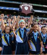 23 October 2018; Suzie Linkiewicz from Virgin Mary GNS, Ballymun, Co Dublin, lifts the shield with team-mates during day 2 of the Allianz Cumann na mBunscol Finals at Croke Park in Dublin. Photo by Harry Murphy/Sportsfile